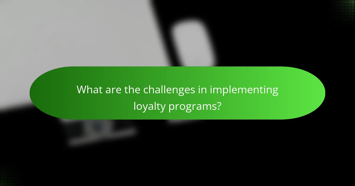 What are the challenges in implementing loyalty programs?